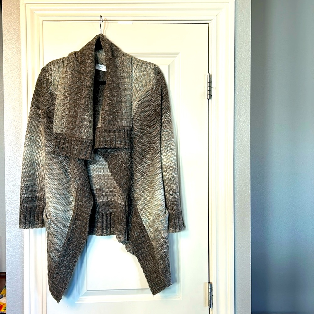 Like New cardigan sweater.
